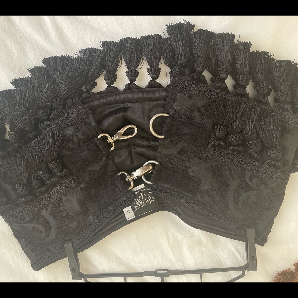 Steam punk or vintage tassel skirt. Heavy duty buckle. Show quality